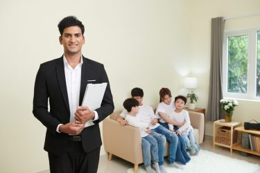 smiling-estate-insurance-agent-1536x1024